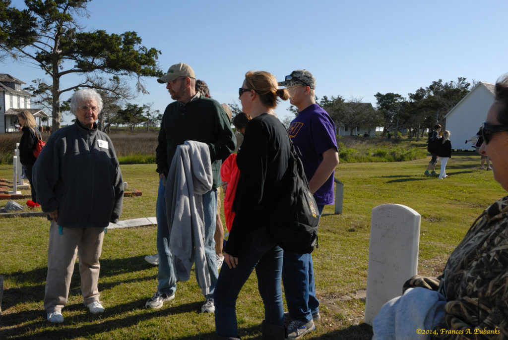 Hazel Arthur Talks With Visitors About the Community Cemetery.